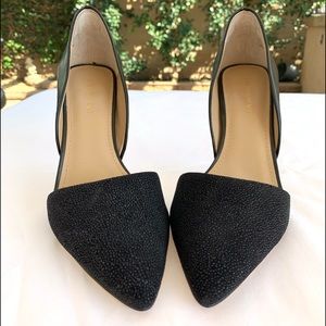 Black Saks Fifth Avenue point-toe leather pumps.